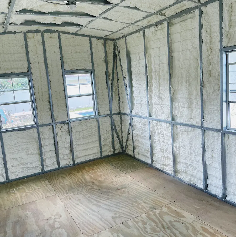 Closed-cell spray foam insulation applied to wall cavities in a residential project in Linwood